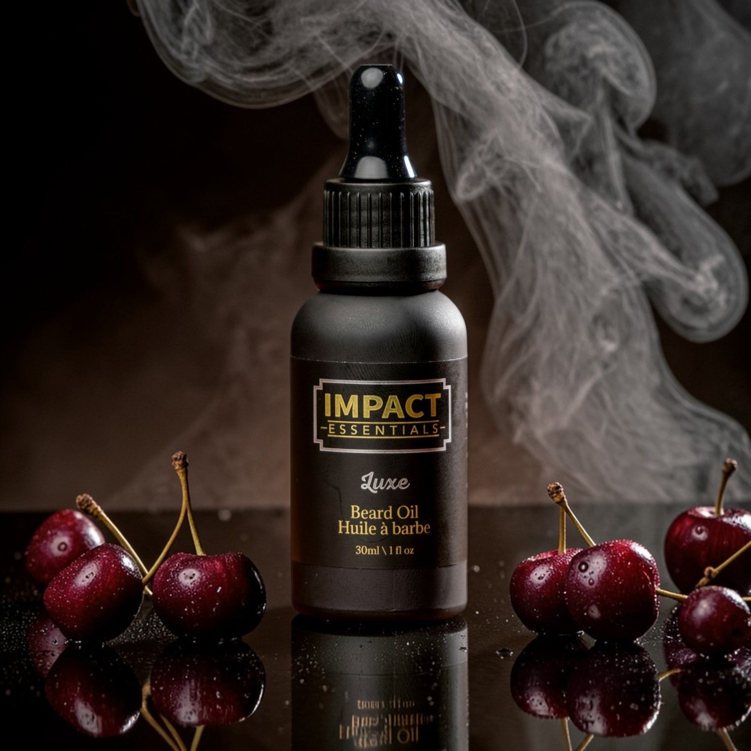 Beard oil bottle labeled 'Impact Essentials' with cherries on a reflective surface.